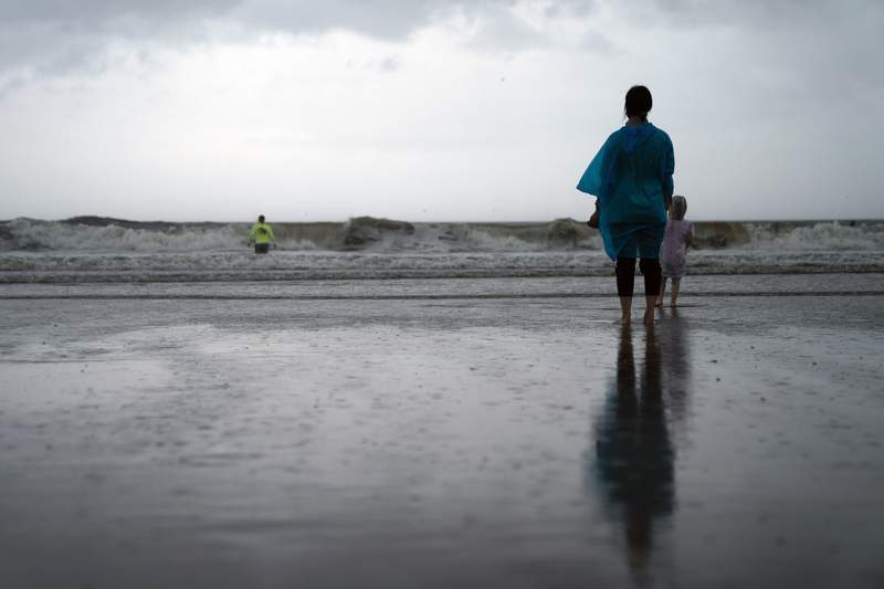Slow-moving storm Henri drenches Northeast US