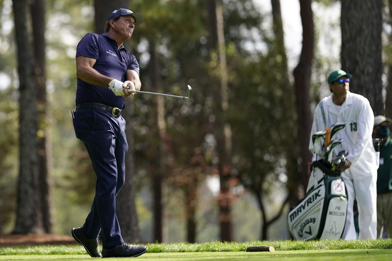 The Latest: Mickelson falls apart on Moving Day, shoots 79