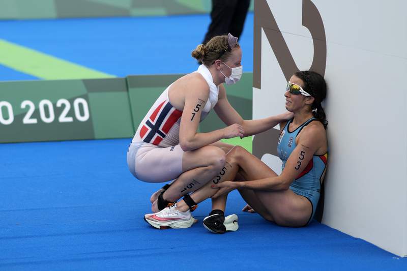 At an extraordinary Olympics, acts of kindness abound