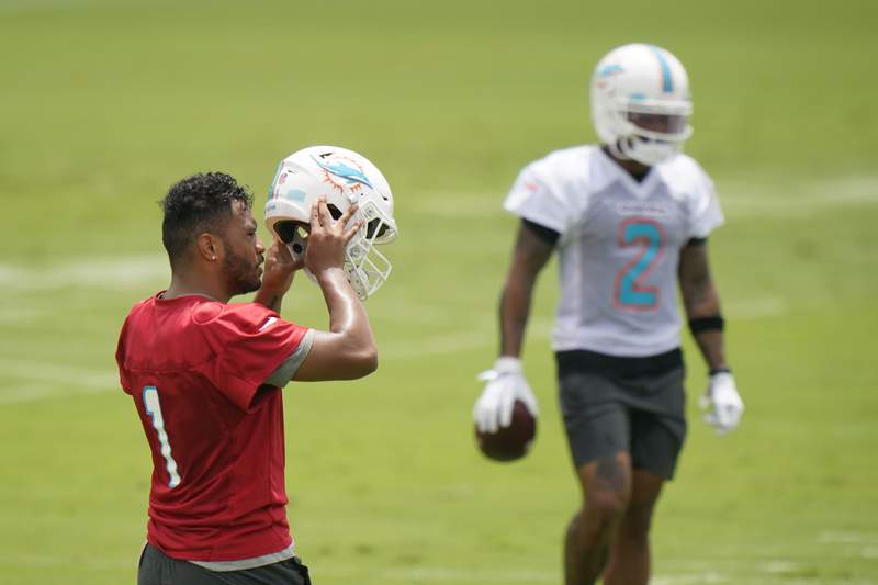 Dolphins open minicamp without Howard, with 5 INTs from Tue
