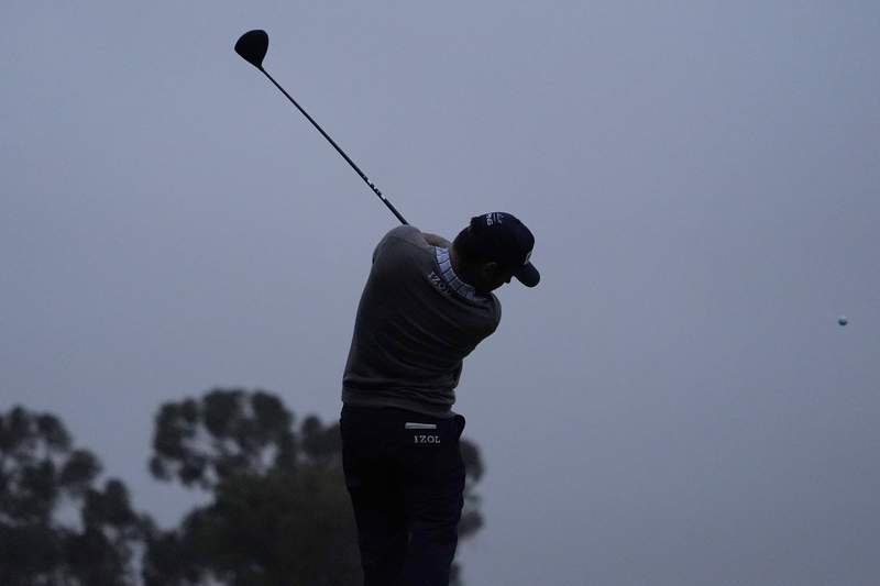 The Latest: First round of U.S. Open suspended by darkness