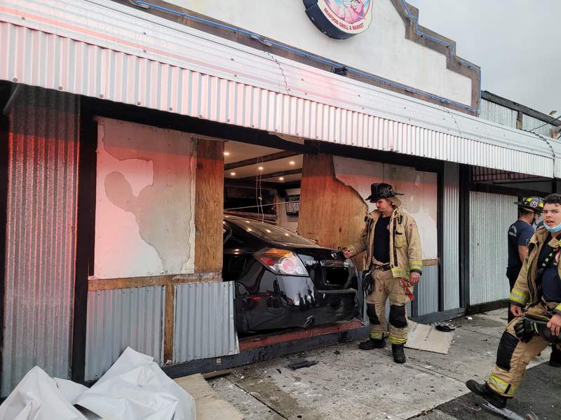 Car crashes through restaurant, driver and 3 people hospitalized