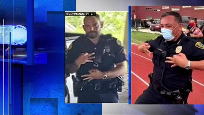 Photo surfaces of police chief making hand gesture