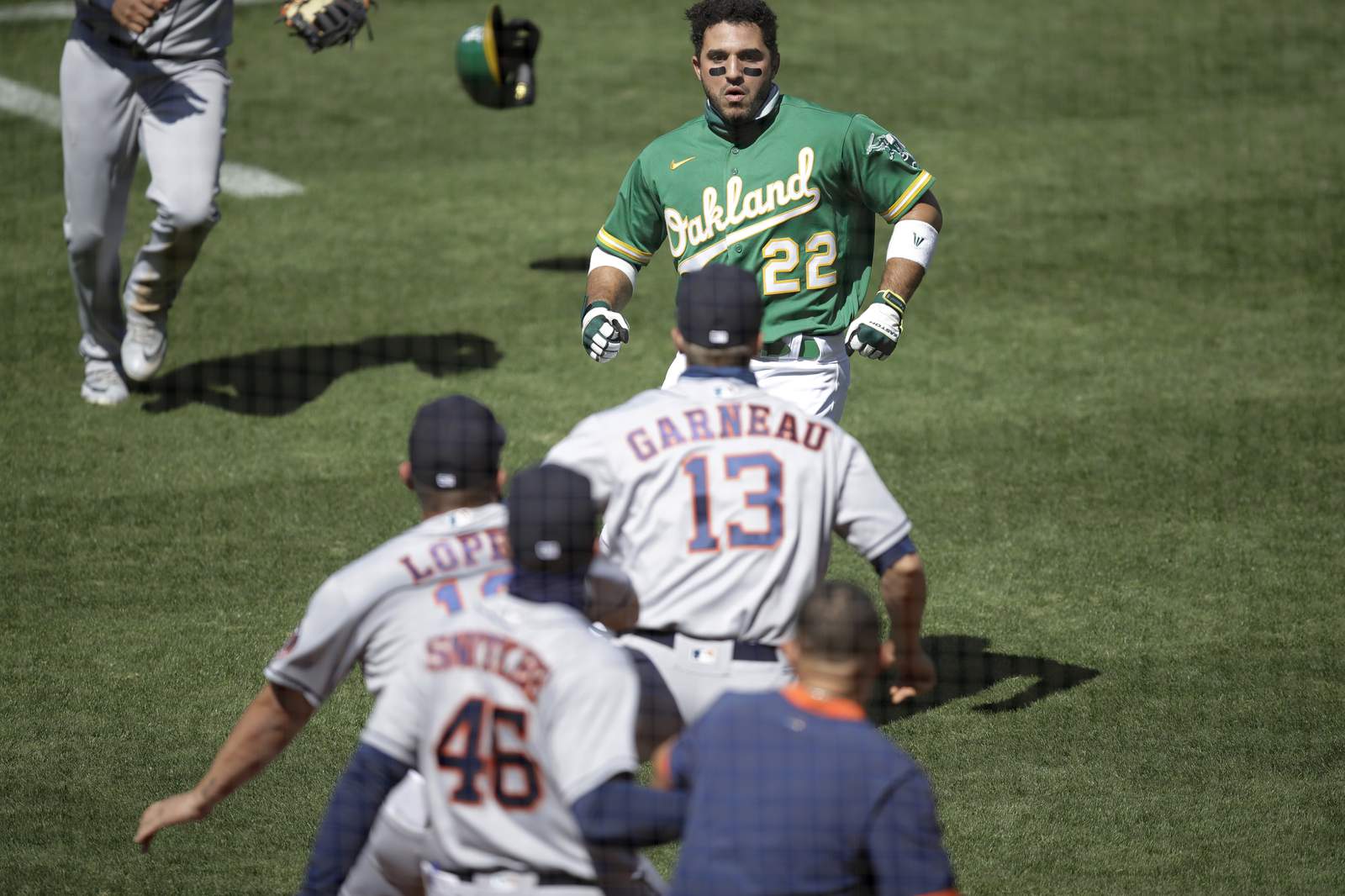 Laureano says Astros coach insulted mother, sparking fracas