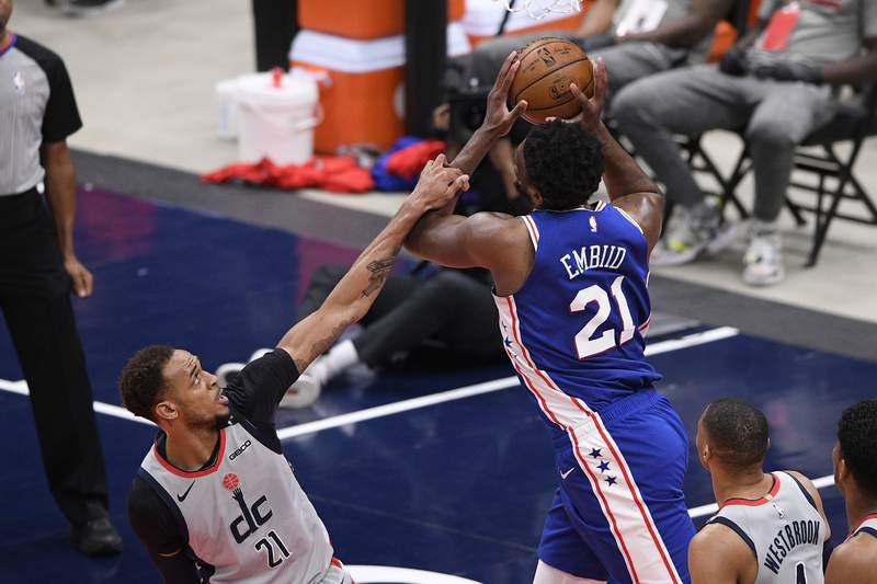 Embiid heads to locker room after fall, sits out 2nd quarter