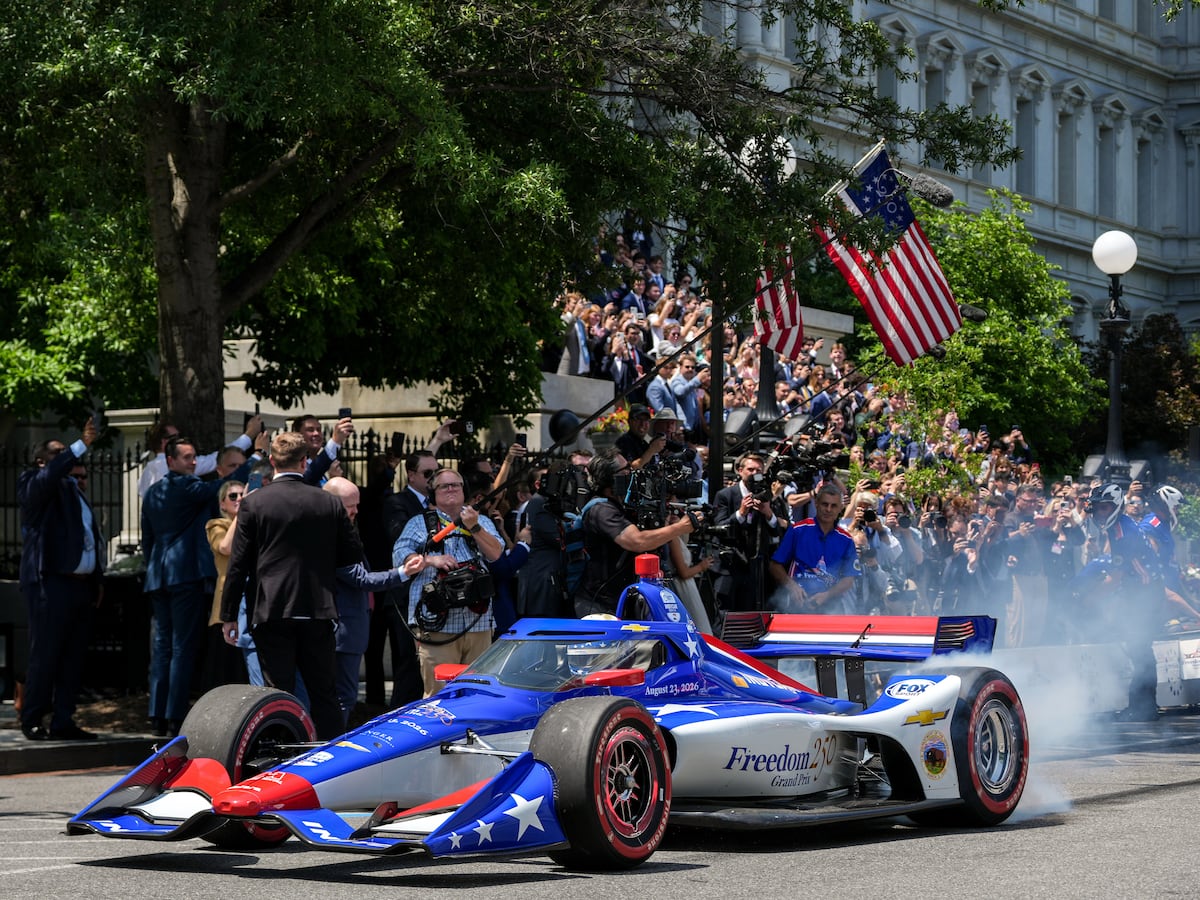 Image linked from the original feed: Trump's IndyCar race: Doing 200 in a 25 mph zone with manhole cover-displacing torque