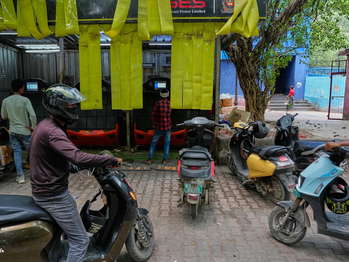 Image linked from the original feed: India's capital part of aggressive electric vehicle targets in bid to curb air pollution