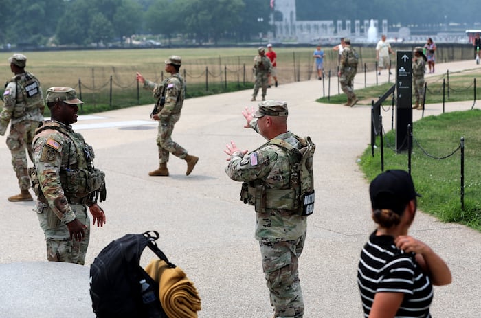 Members of the National Guard patrol around the Washington Monument, before Marine One, with President Donald Trump aboard, departs near the White House, Friday, July 17, 2026, in Washington. (AP Photo/Rahmat Gul) (Copyright 2026 The Associated Press. All rights reserved.) (Rahmat Gul/AP Photo/Rahmat Gul)
