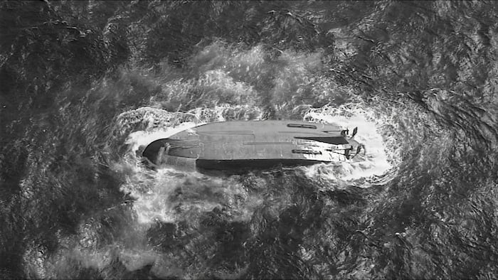 6 crew still missing after overturned ship that disappeared after typhoon is found near Saipan