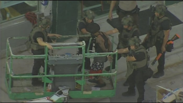 Man in custody after barricading himself on the roof of a McDonald’s in ...