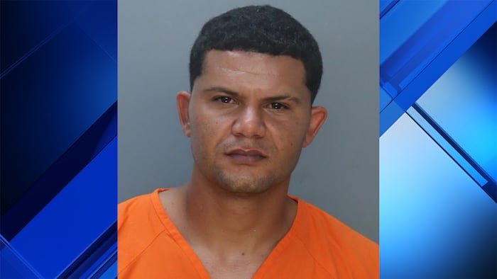 Driver arrested after woman falls from trunk of speeding vehicle in Miami-Dade, deputies say