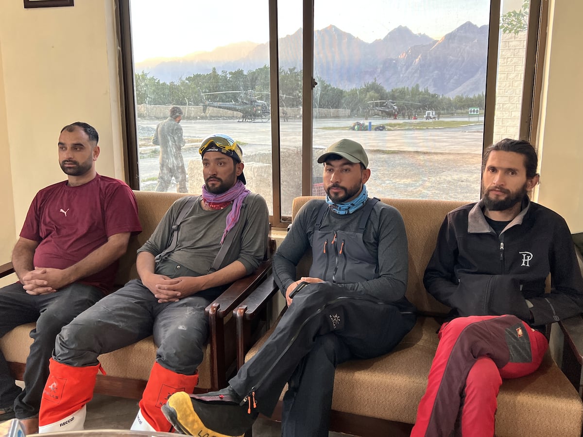 Image linked from the original feed: Pakistan teams search on foot for remains of climbers as weather grounds helicopters