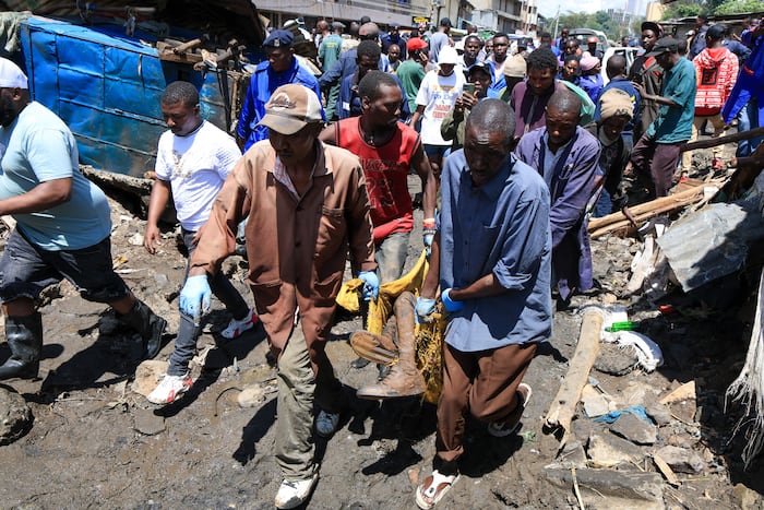 At least 25 dead in Kenya after heavy rain brings flash floods and flight disruption to Nairobi