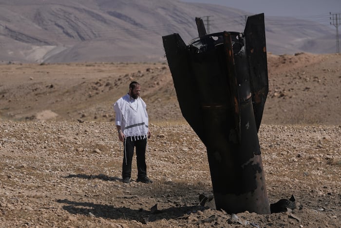 Israel and Iran trade strikes, threatening to drag the region back into full-scale war