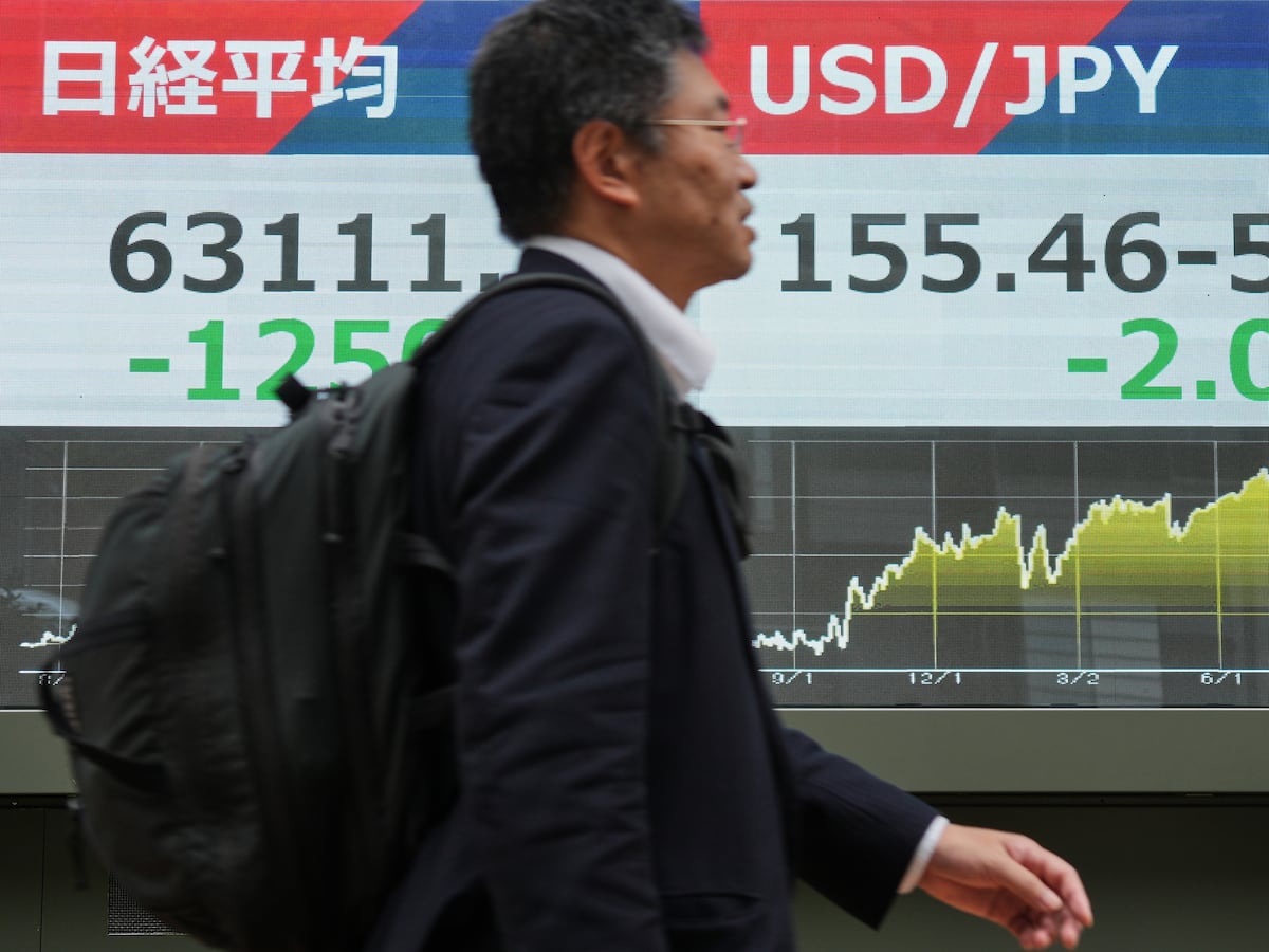 Image linked from the original feed: Asian stocks are mixed as yen jumps against the dollar, while oil prices slip