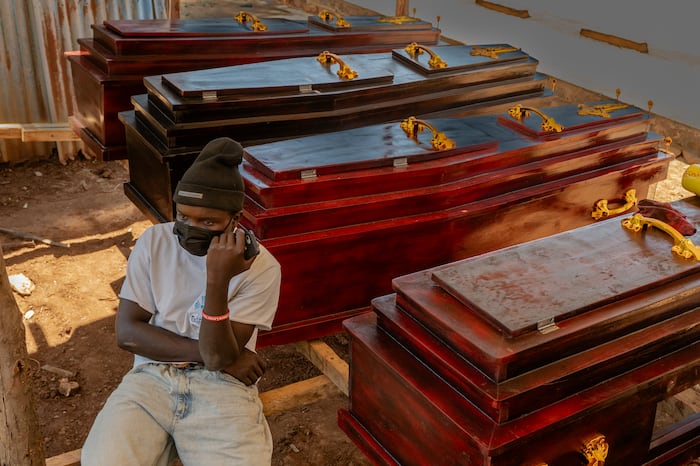 Congo curtails funeral wakes in Ebola outbreak as WHO upgrades risk assessment