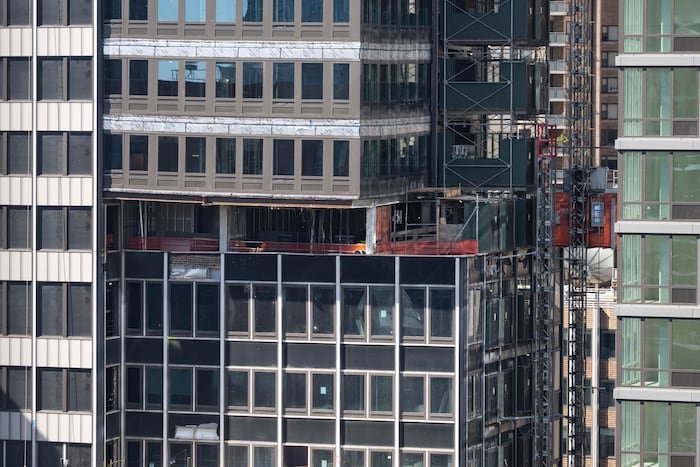 Some evacuation orders and street closures remain as work continues on a NYC high-rise that buckled