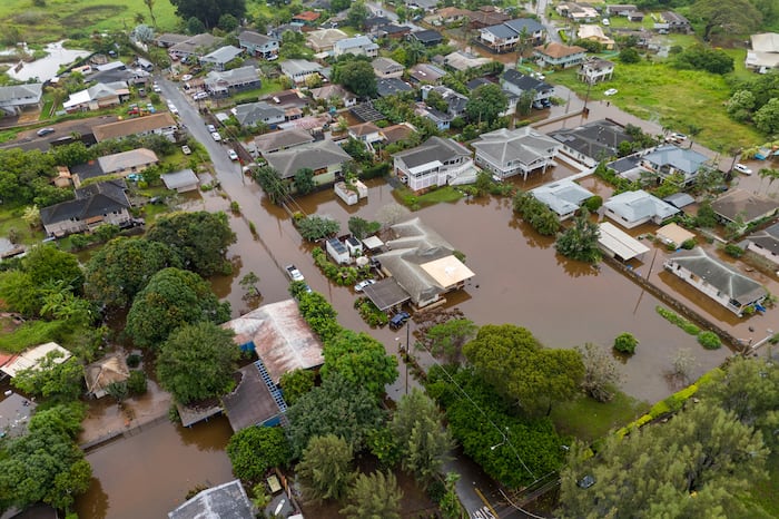 Over 5,500 told to evacuate flooding in Hawaii as officials warn 120-year-old dam could fail