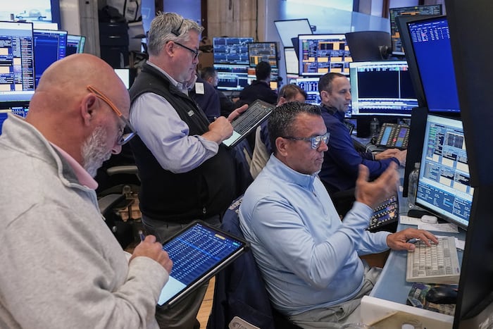 US stocks hover just below records as oil slips on hopes of an Iran deal