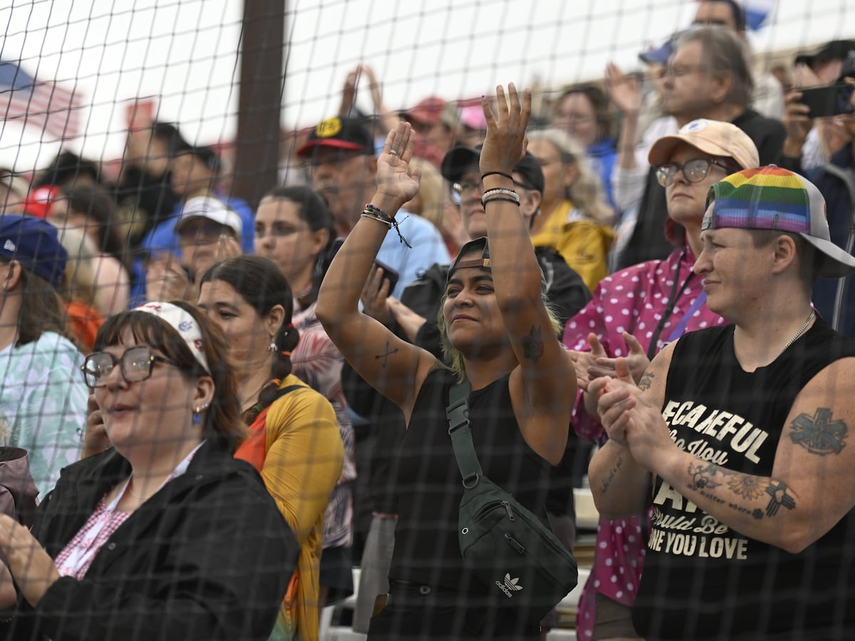 Image linked from the original feed: Women's Professional Baseball League makes a rainy debut in front of enthusiastic crowd