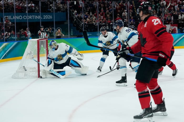 Nathan MacKinnon scores late as Canada beats Finland to reach the Olympic gold-medal game