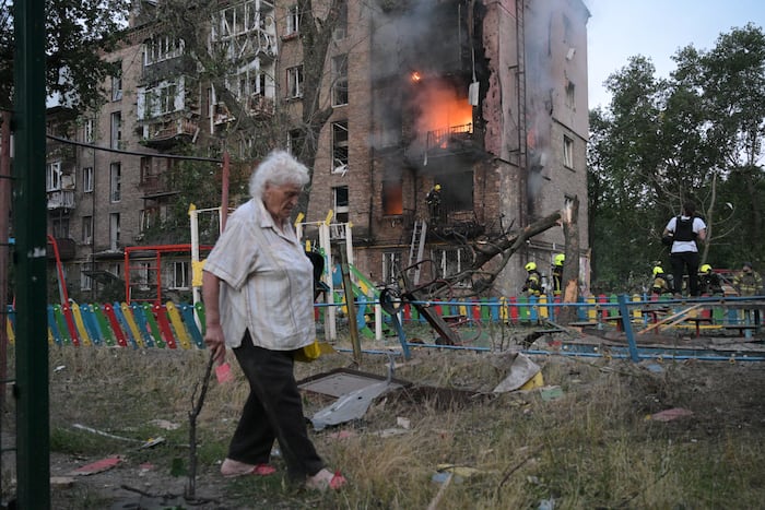 Russian attack kills at least 13, injures scores and causes damage across Ukraine capital