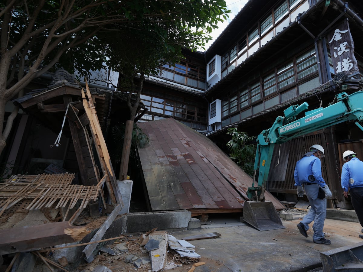 Image linked from the original feed: Japan ends rescue operation at a mall that collapsed after a strong quake