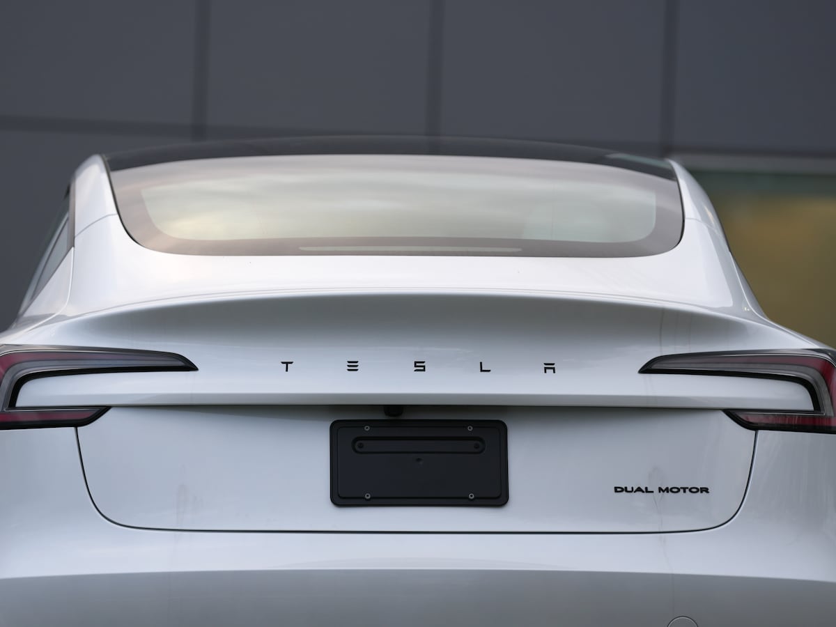 Image linked from the original feed: Earnings at Musk's car company fall as research spending cuts into profit from selling cars