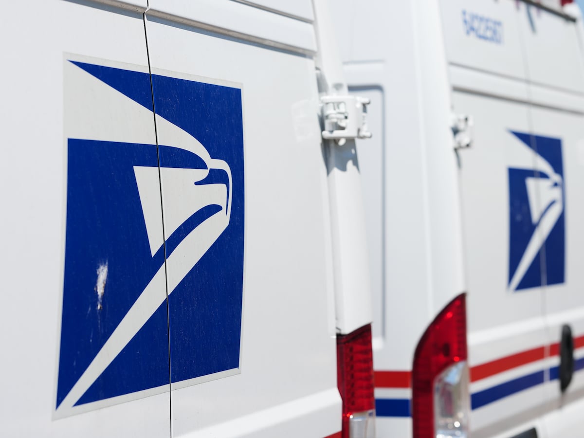 Image linked from the original feed: Trump's attacks on mail balloting and concerns over delays turn midterms spotlight on Postal Service