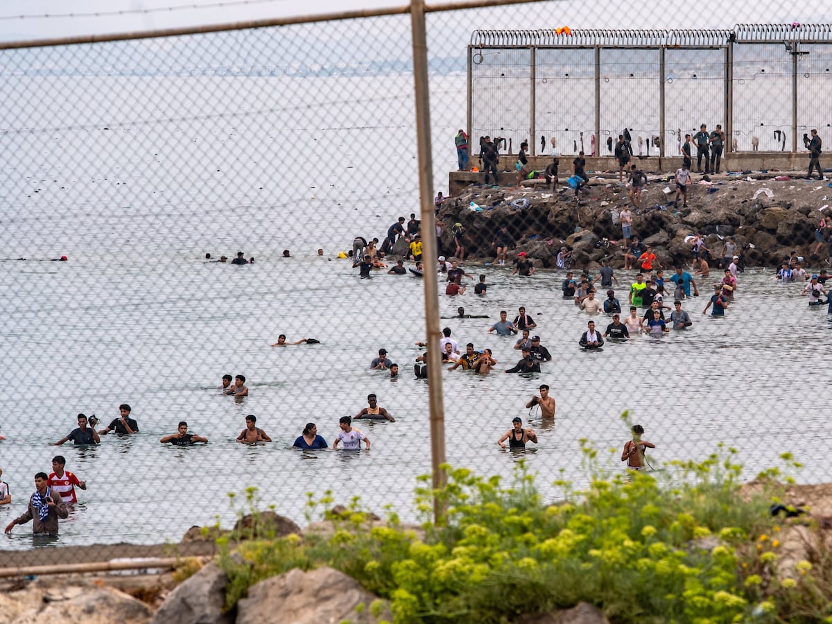 Image linked from the original feed: Runaway online rumors sparked frantic rush by migrants to the Spanish enclave of Ceuta