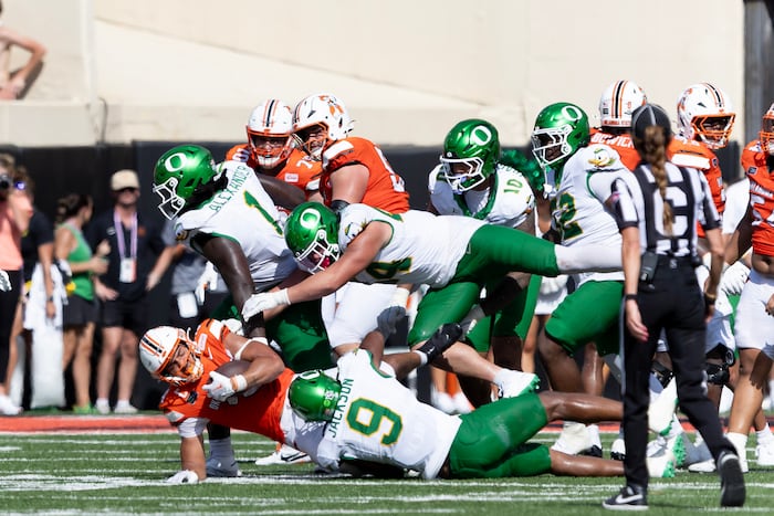 Texas takes No. 1 in the AP Top 25, Oregon falls and Michigan returns