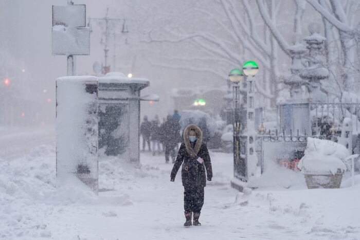 The Latest: Snowfall intensifies in Northeast as many are under blizzard warnings and travel bans