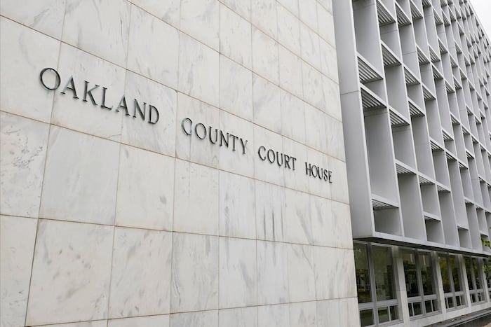 Michigan woman pleads no contest to abuse after 3 kids are found living alone for years
