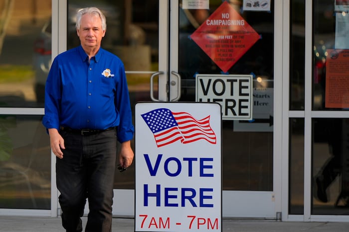The Latest: Kentucky polls begin to close as Massie faces Trump-backed challenger