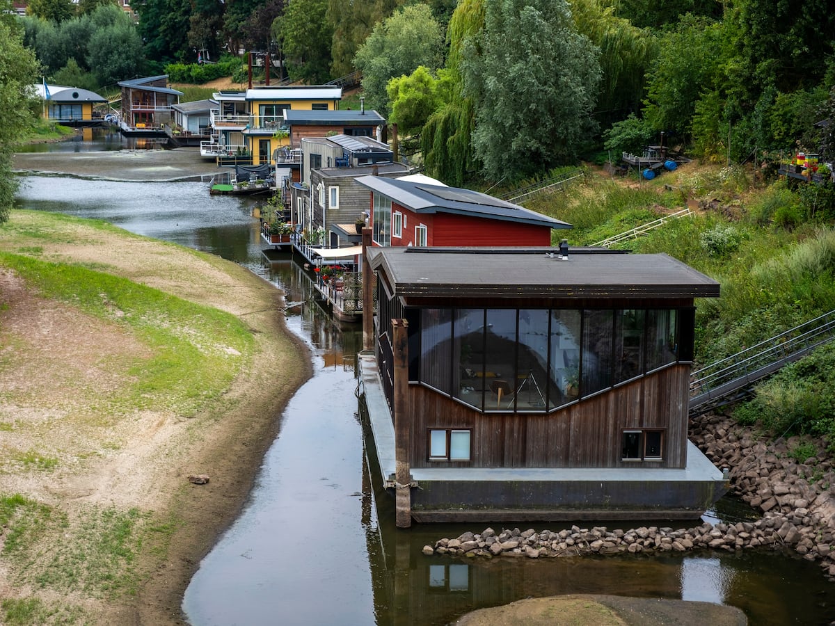 Image linked from the original feed: Dry, hot summers are putting Dutch dikes at risk and threatening German river trade