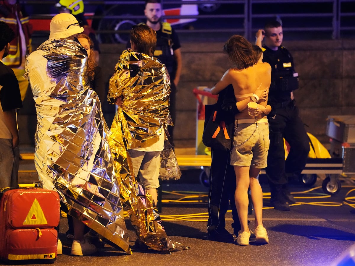 Image linked from the original feed: German police hunt suspect in Berlin Pride van-ramming attack that left 1 dead and 16 injured