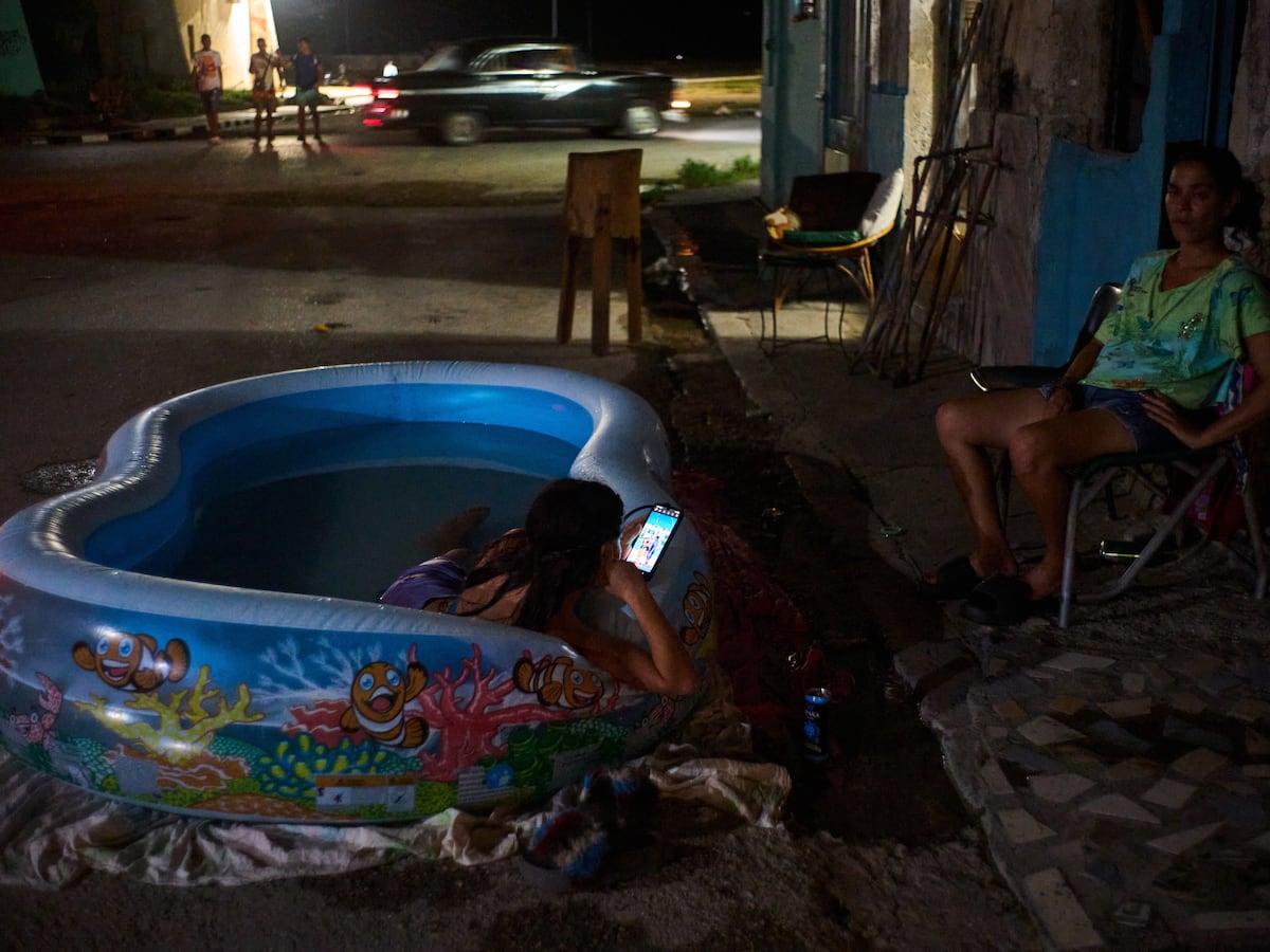 Image linked from the original feed: As blackouts stretch for days, life in Cuba revolves around small bursts of electricity