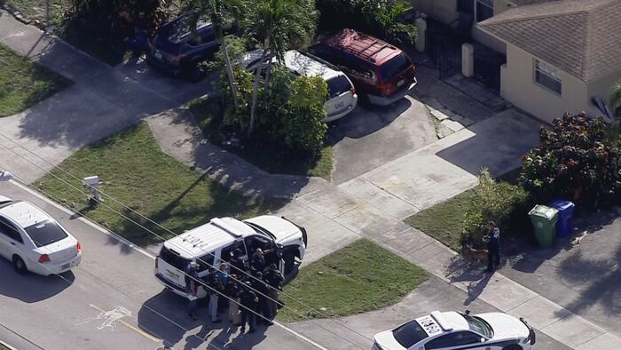 Man in custody after barricading himself inside vehicle