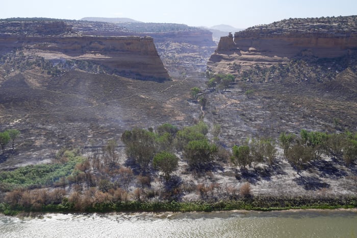 Wildfire southwest of Denver forces thousands to evacuate and destroys more than 160 structures