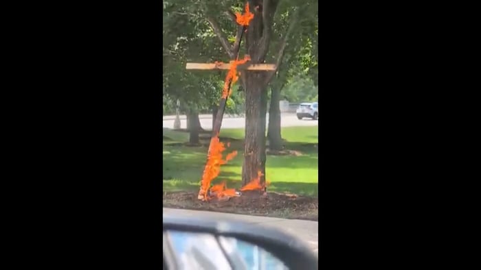 A person is in custody in a Chicago cross burning investigation, police say