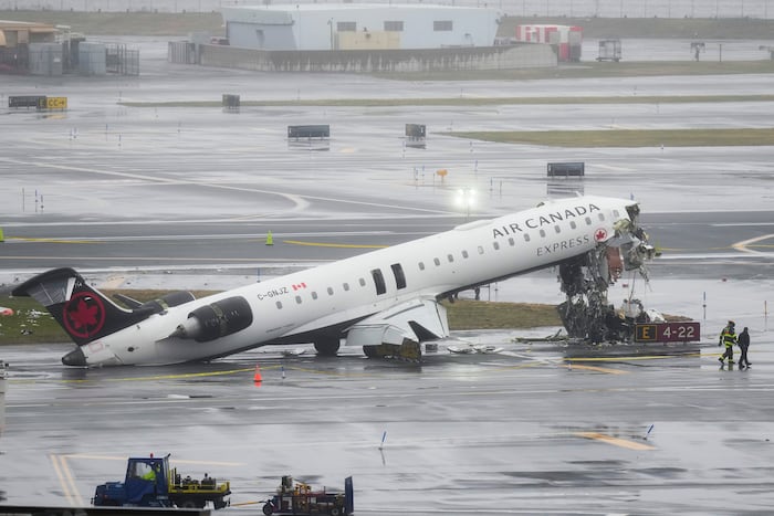2 pilots killed when jet collides with fire truck at New York's LaGuardia Airport
