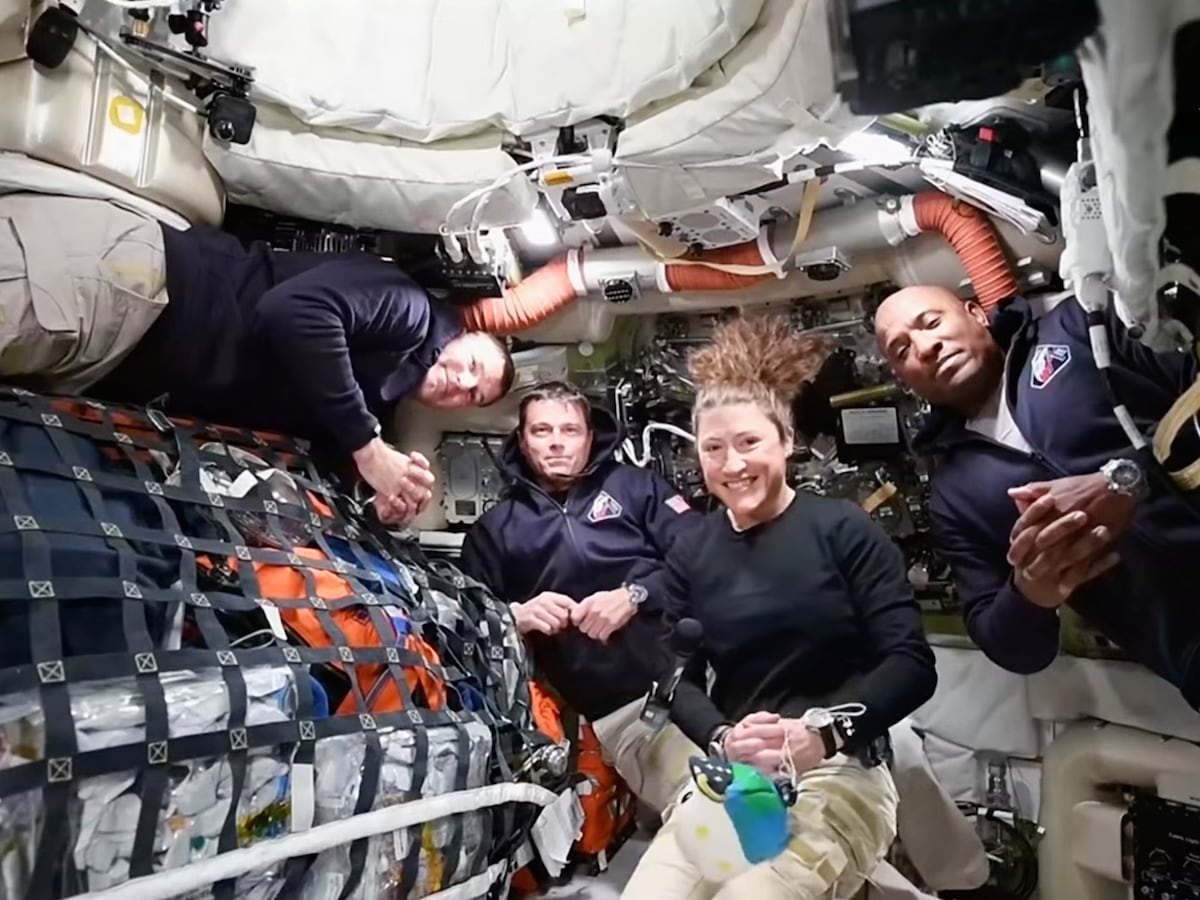 This image taken from video provided by NASA shows the Artemis II crew, from left, Canadien astronaut and mission specialist Jeremy Hansen, Commander Reid Wiseman, mission specialist Christina Koch and pilot Victor Glover as they appear on a video conference from the moon's orbit Thursday, April 2, 2026. (NASA via AP)