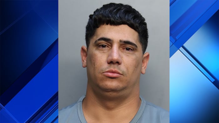 Miami delivery driver accused of photographing laptop package, then taking it back