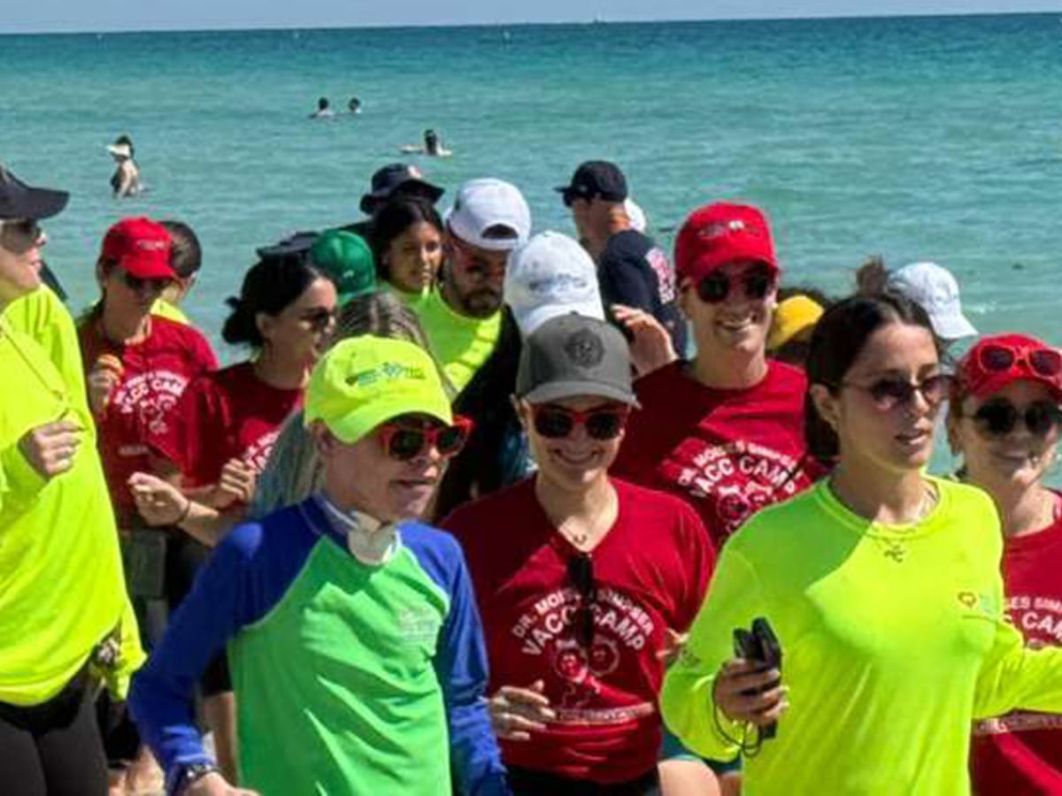 Dr. Moises Simpser VACC Camp participants have fun on the beach on Tuesday in Miami Beach.