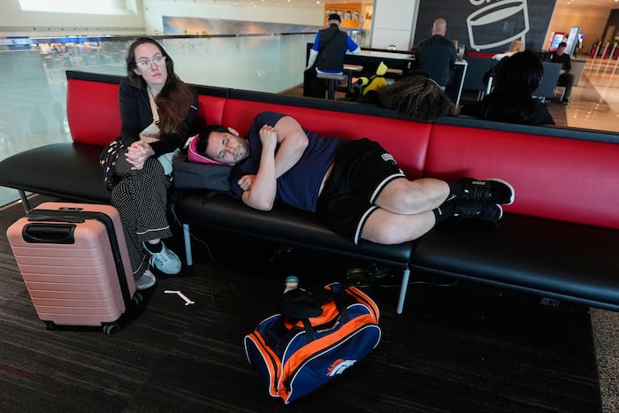 Flight cancellations and delays continue after US storms dump snow in the Midwest and head east