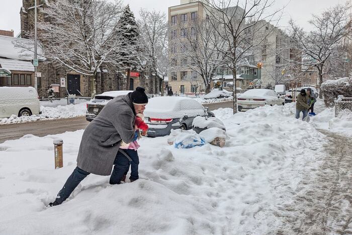 More snow falls on the Northeast US, where huge piles remain from the last storm