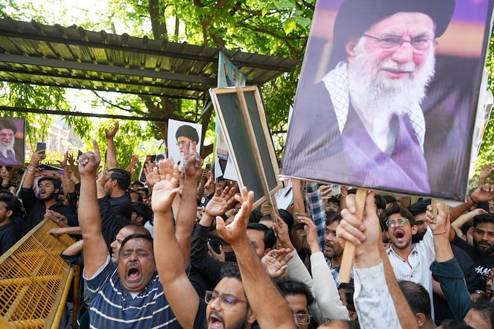 Calls for peace and flashes of anger after US and Israeli attacks kill Iran's Khamenei