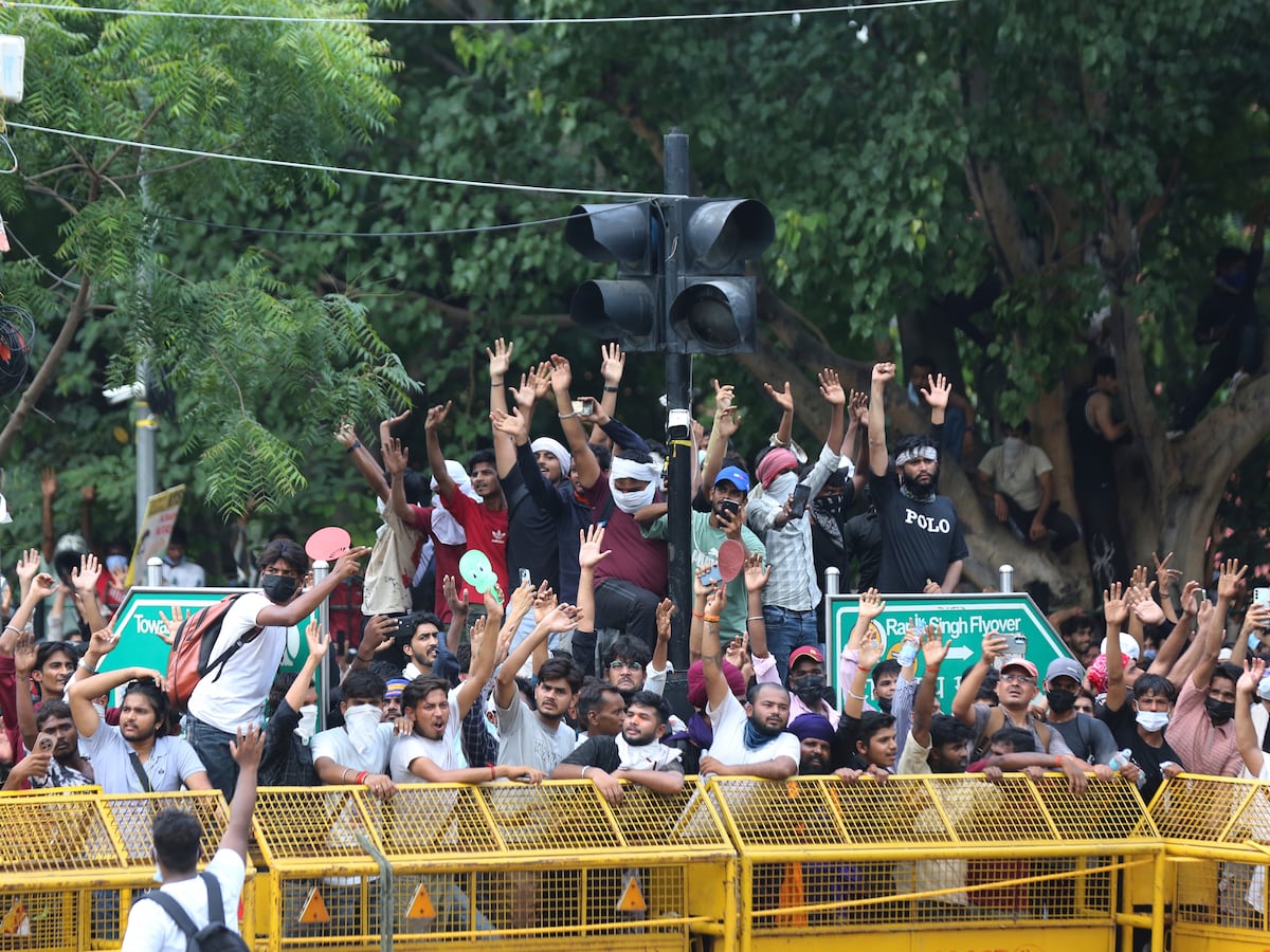 Image linked from the original feed: India's education minister resigns in major victory for youth-led 'Cockroach' movement