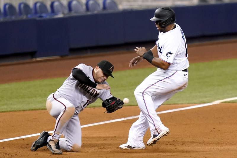 Aguilar sparks 6-run 8th as Marlins beat Diamondbacks 9-3