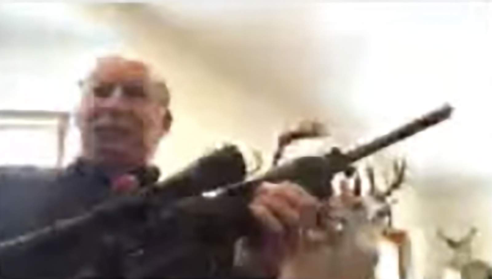 Michigan official shows gun after public meeting criticism